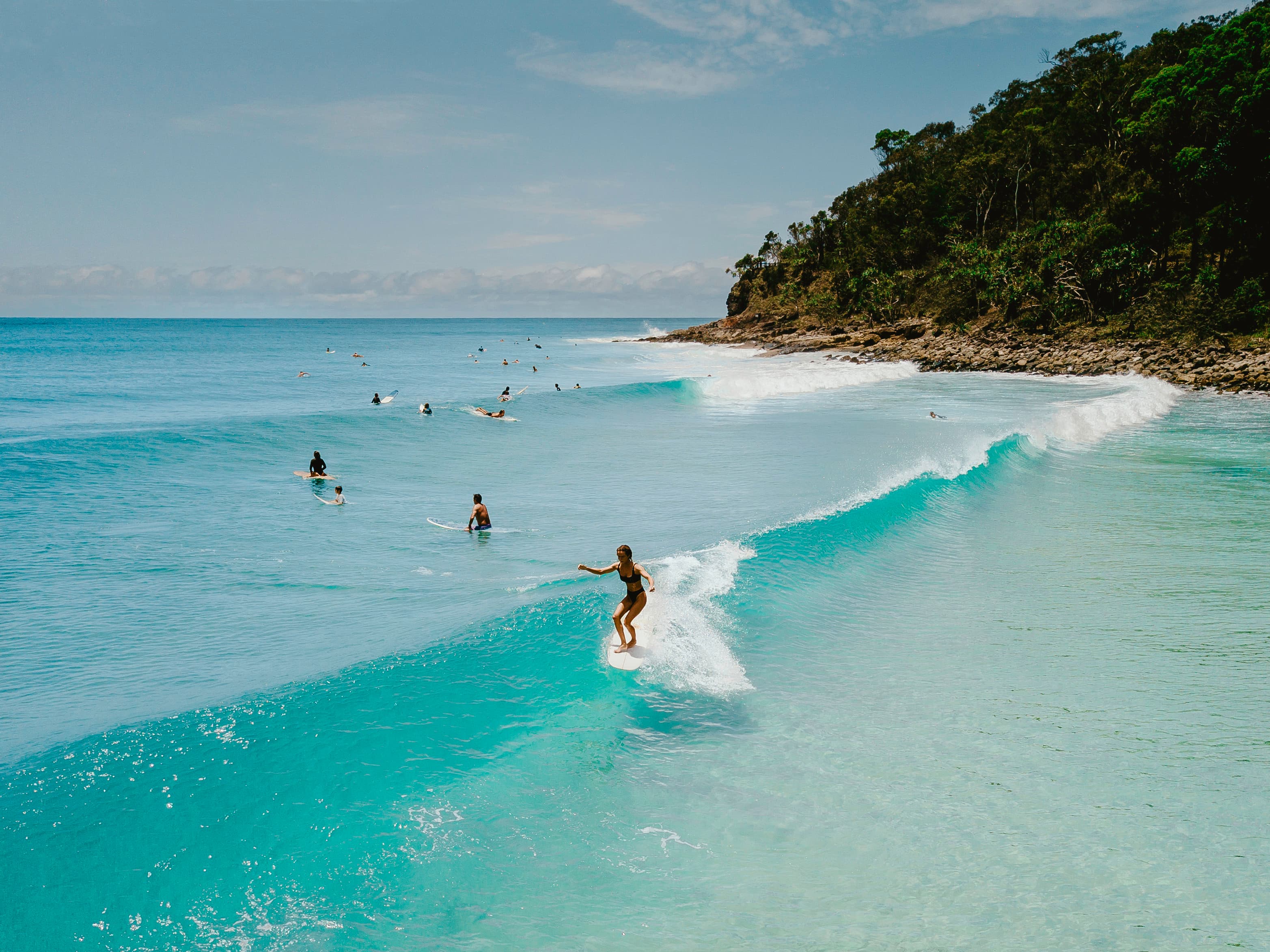Australia is home to over 10,000 beaches — and whether you’re after turquoise lagoons, golden surf breaks, or white-sand bays, there’s one with your name on it!